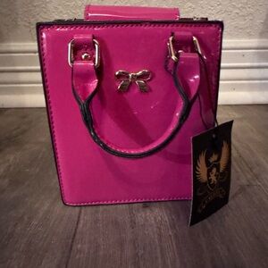 Elegant Pink Handbag with Bow Accent